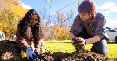 Students in the Cornell Botanic Gardens' Learning by Leading program work on the new medicinal garden at Onondaga Nation School in Nedrow, New York.